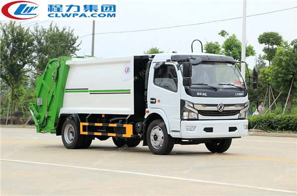 國六東風凱普特壓縮垃圾車交付煙臺某鄉(xiāng)村居委會